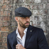 Men's driving hat in black - newsboy cap on model