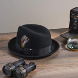 Men's black wool fedora crushable on table