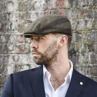 Men's brown caddie cap on model