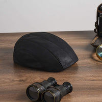 Men's black caddie cap - on table